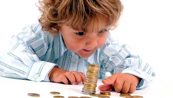 Як навчити дитину поводитися з грошима